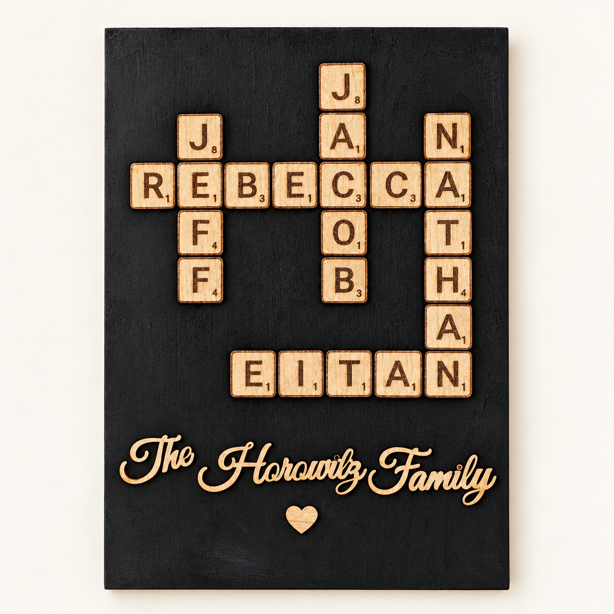 Personalized black wood family name art with natural wooden letter tiles and Horowitz Family script