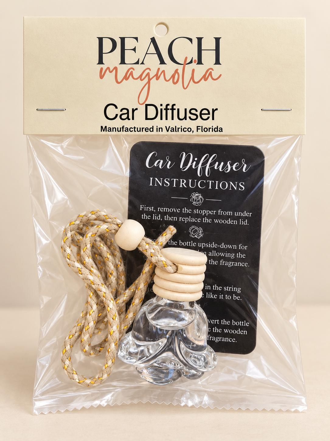 Packaged Peach Magnolia car diffuser with instruction card