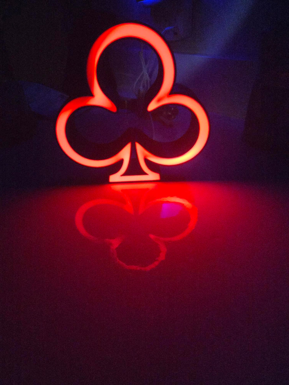 Actual illuminated club suit tabletop light with red glow