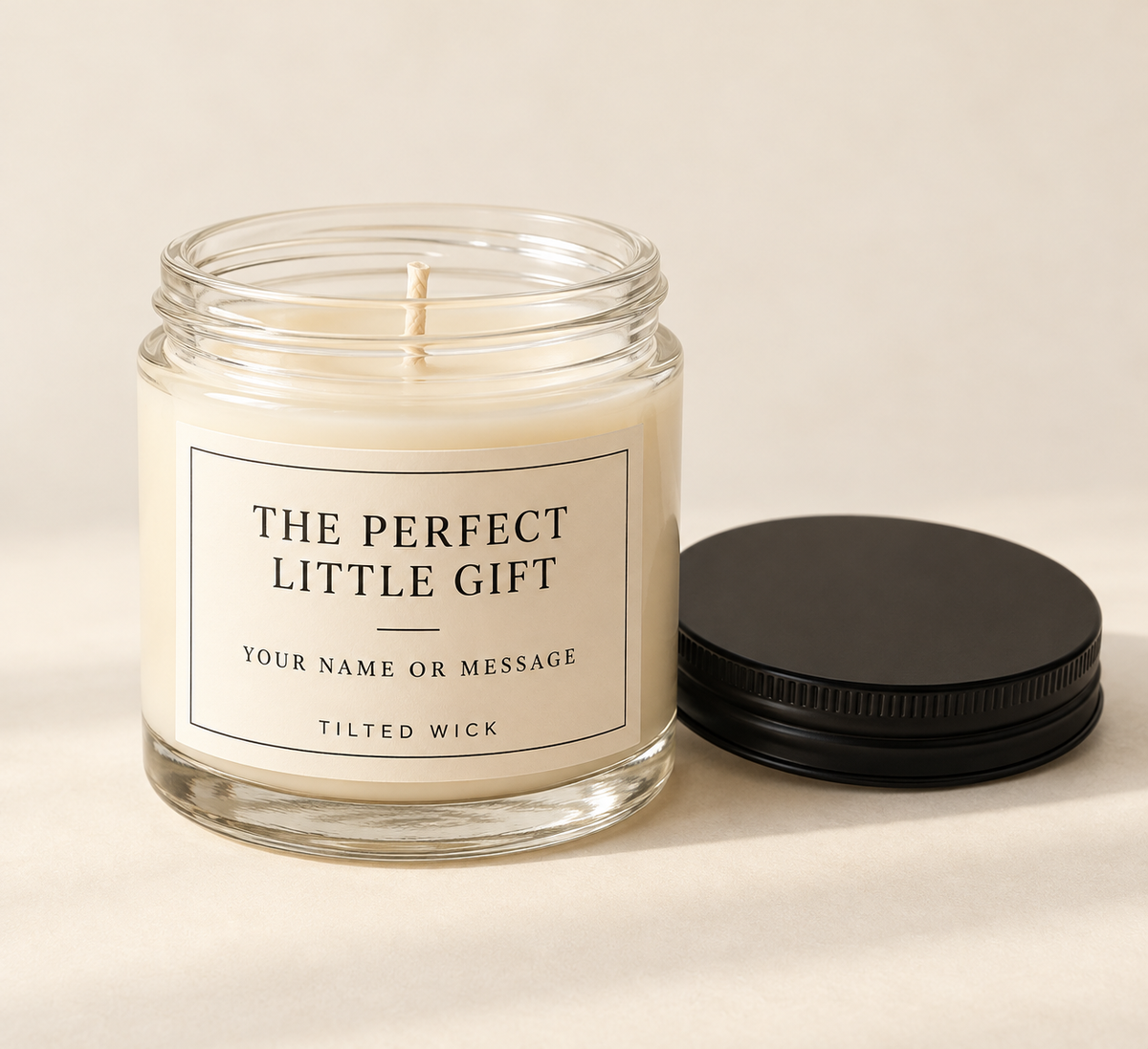 Concept mockup of a 4 oz glass candle jar with a personalized label