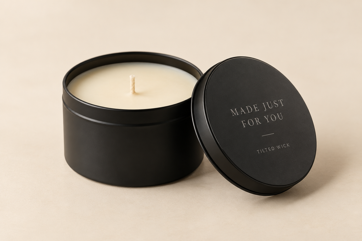 Concept mockup of a 4 oz candle tin with example lid engraving