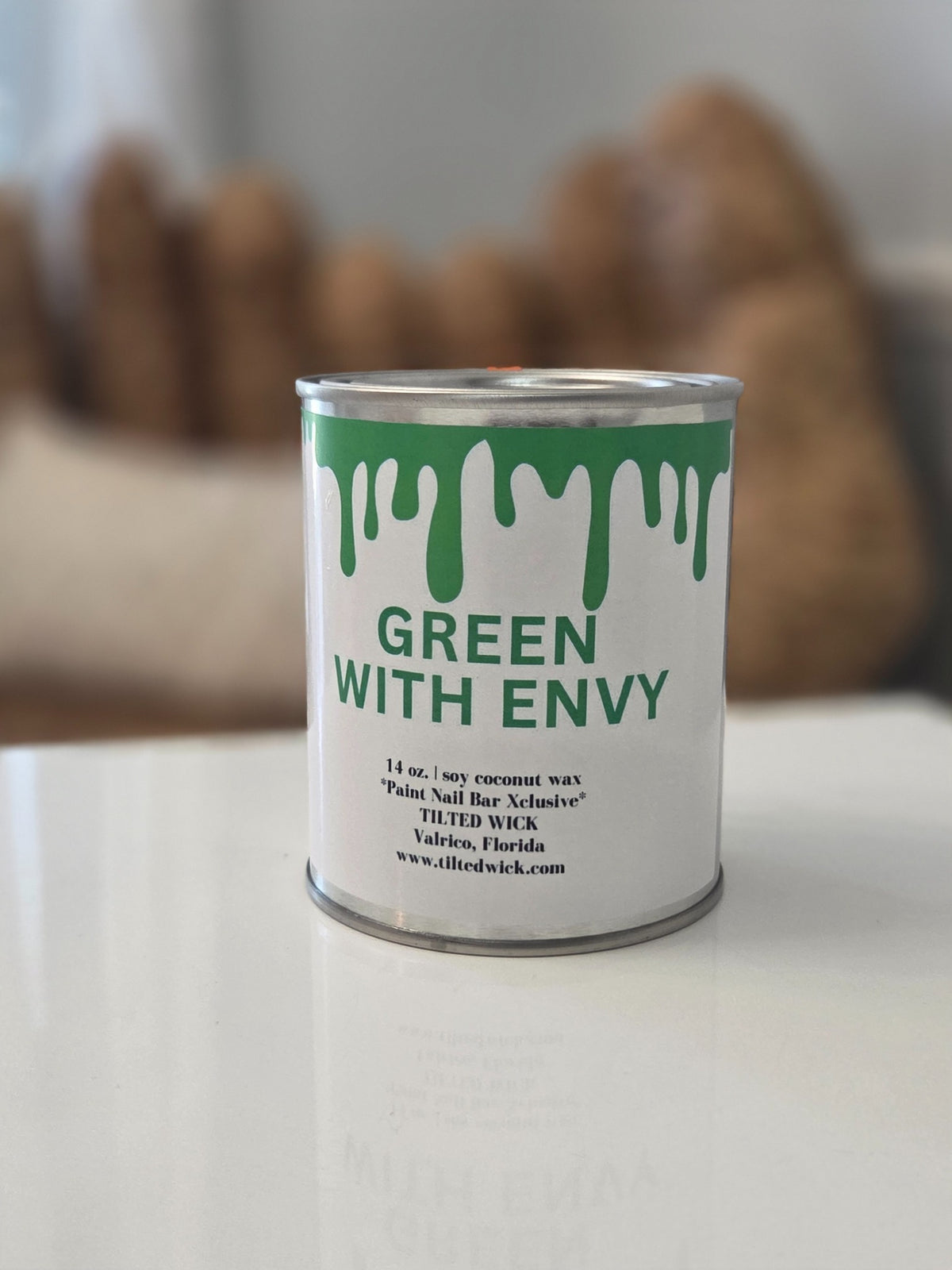 14-ounce paint tin candle showing a green paint-drip label design, Green With Envy example