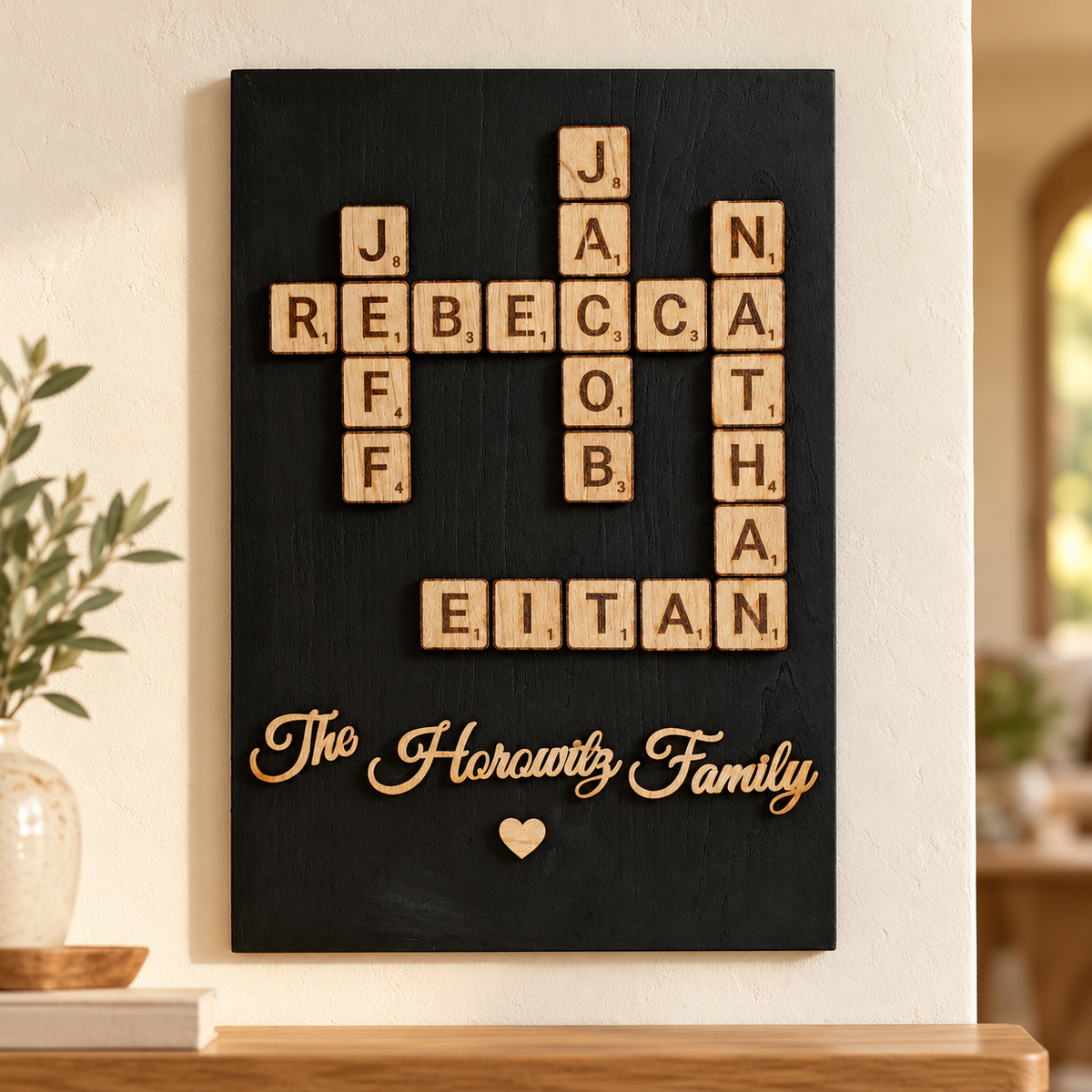 Personalized black wood family name art with natural wooden letter tiles and Horowitz Family script